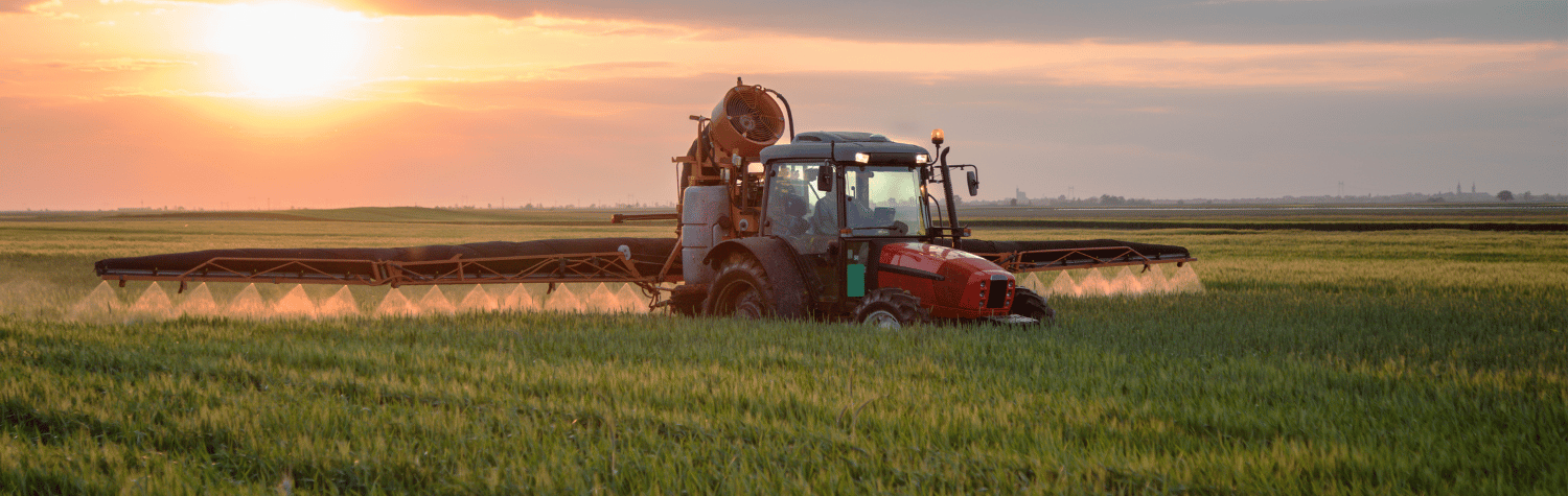 Tractor sprayer spraying pesticide