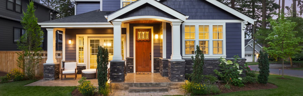 Craftsman-style home with a landscaped yard, treated with minimum-risk pesticides