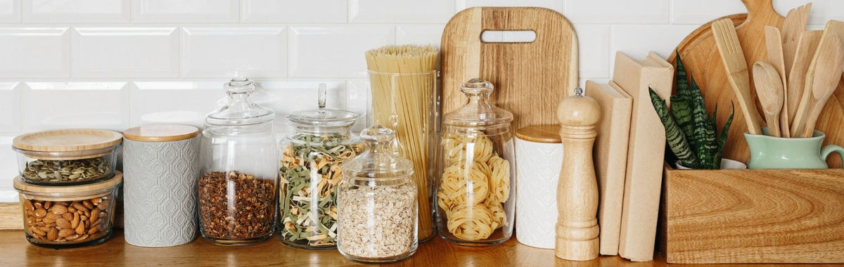 Pantry shelf of sealed glass jars, a simple winter pest control step