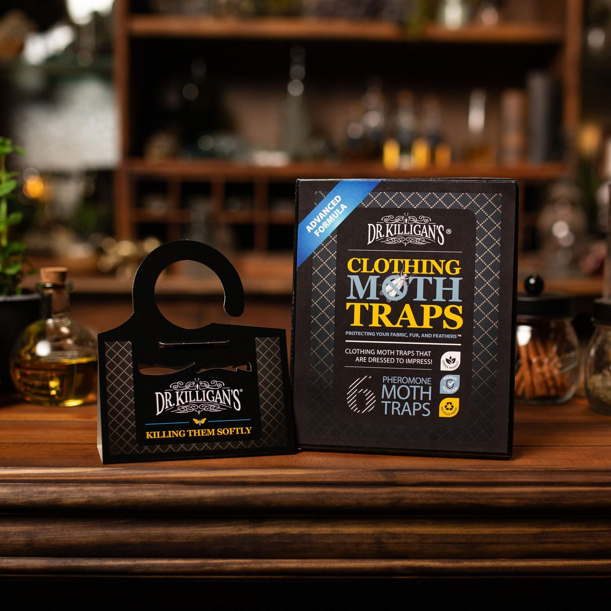 Dr. Killigan's Clothing Moth Traps on a wooden surface with a blurred background