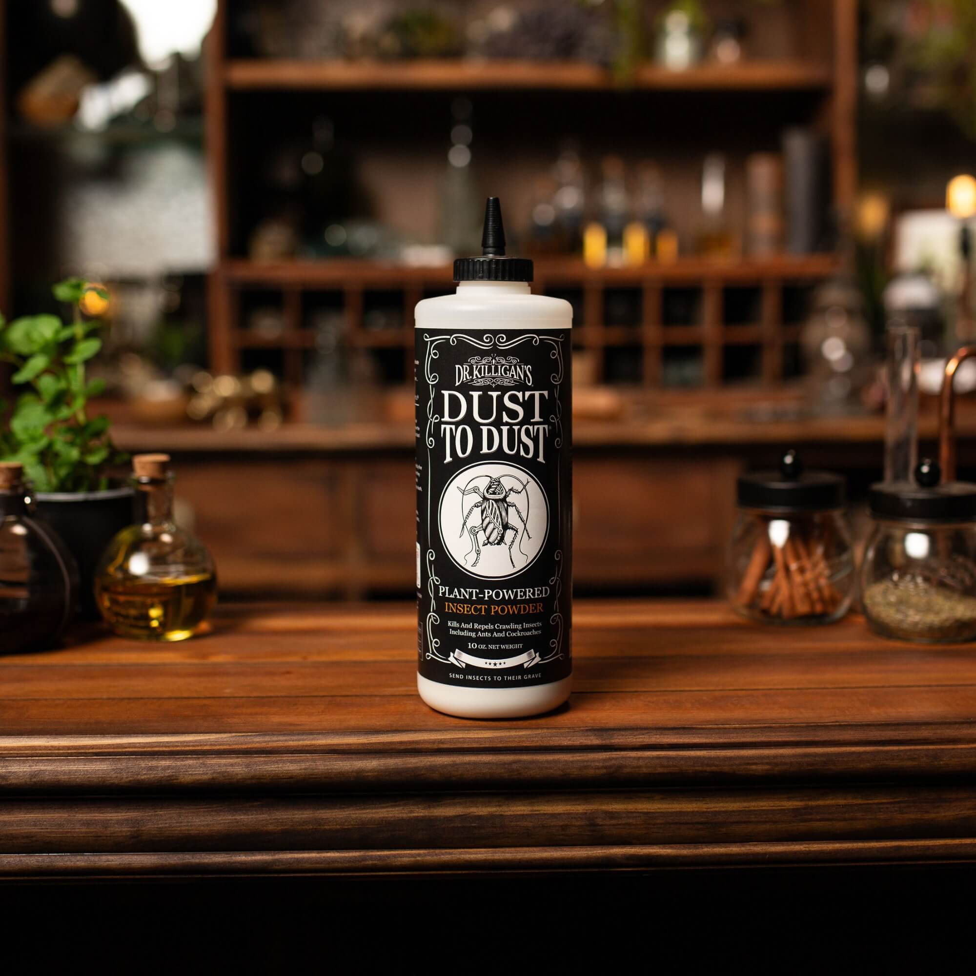 Bottle of 'Dust to Dust' insect powder on a wooden surface with a blurred background